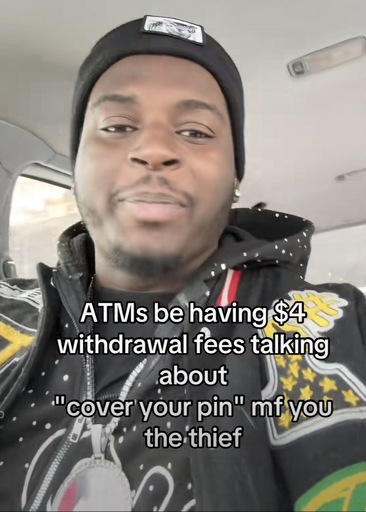 Selfie picture of a driver with the caption: ATMs be having $4
withdrawal fees talking about
'"cover your pin" mf you the thief.